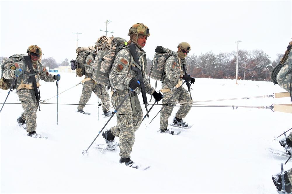 Tent-building among skills Airmen learned during January cold-weather training at Fort McCoy