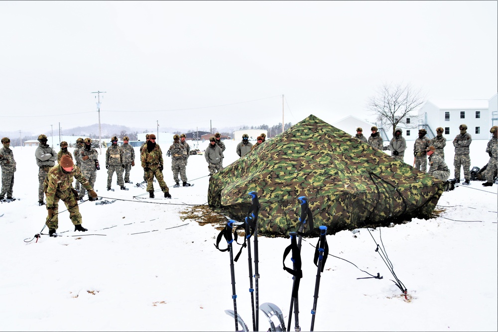 Tent-building among skills Airmen learned during January cold-weather training at Fort McCoy