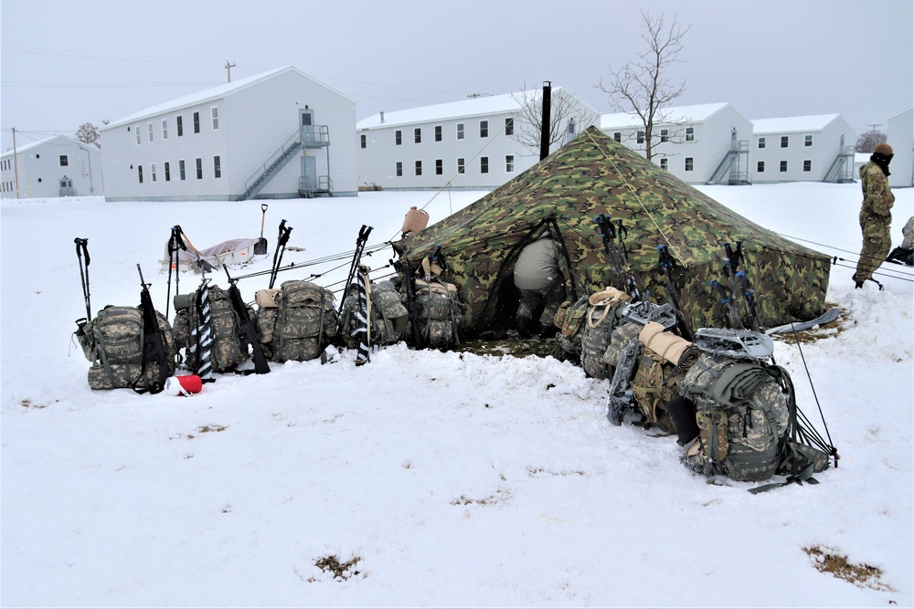 Tent-building among skills Airmen learned during January cold-weather training at Fort McCoy