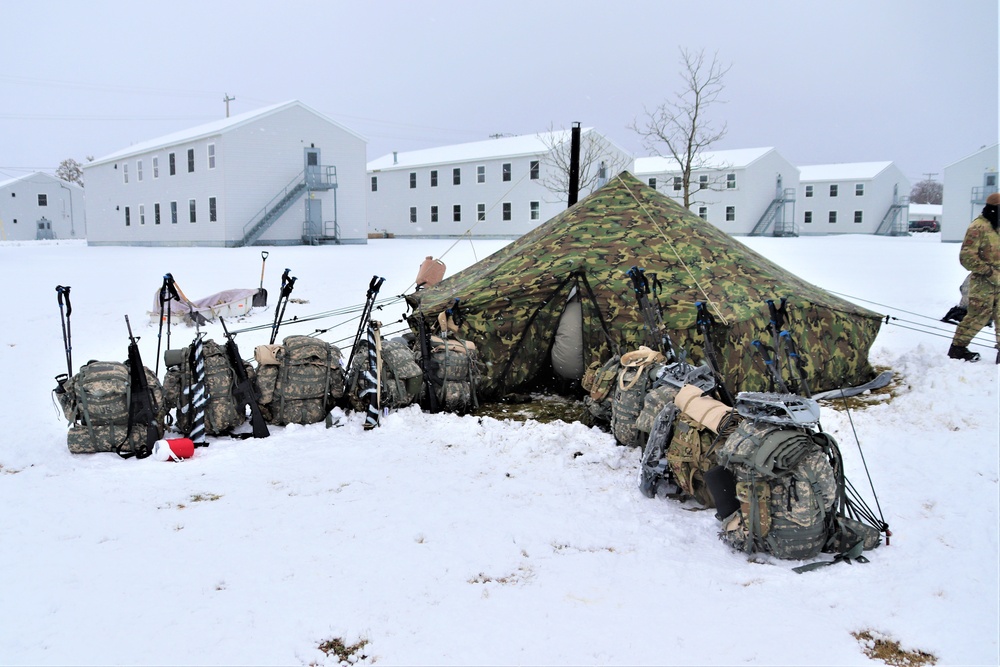 Tent-building among skills Airmen learned during January cold-weather training at Fort McCoy