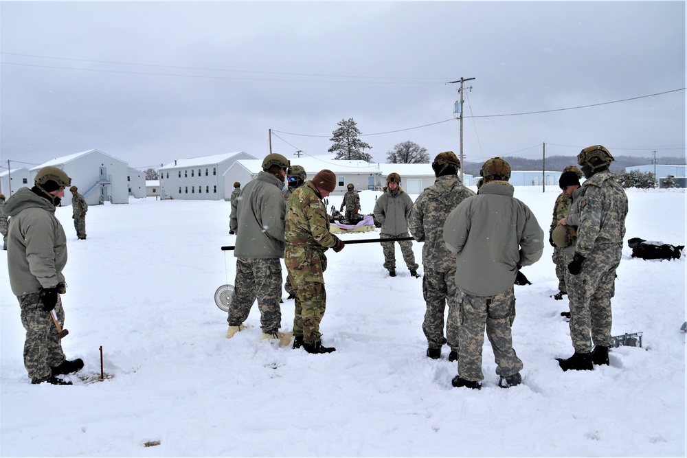 Tent-building among skills Airmen learned during January cold-weather training at Fort McCoy