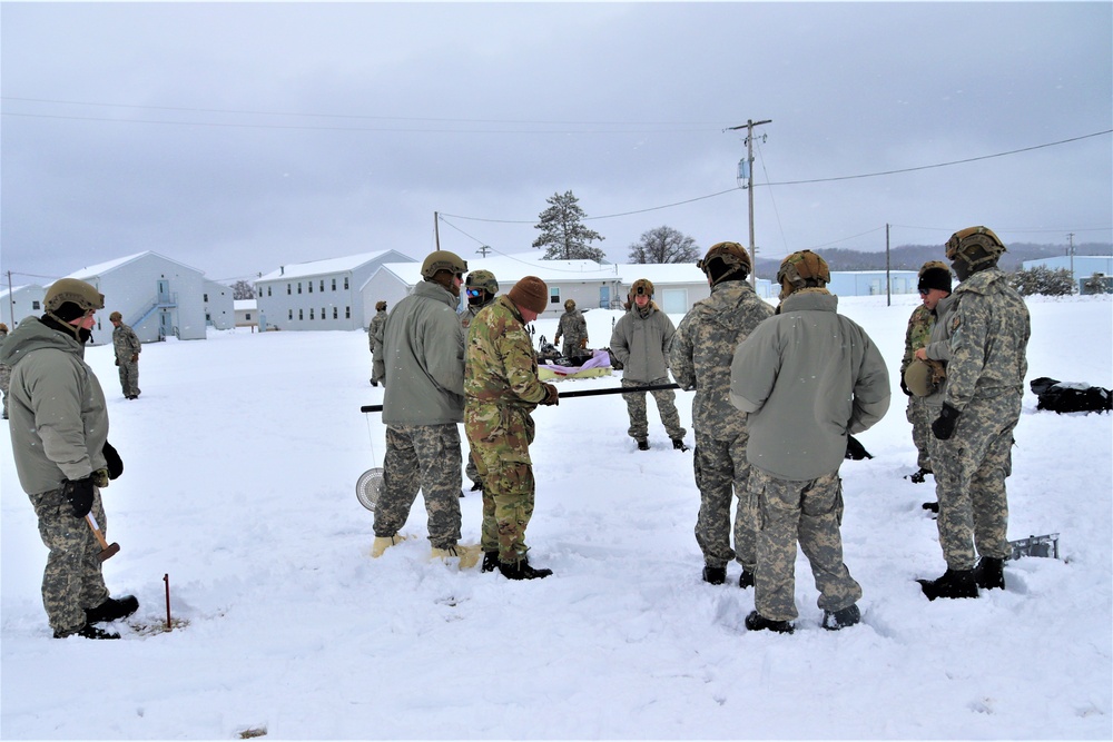 Tent-building among skills Airmen learned during January cold-weather training at Fort McCoy