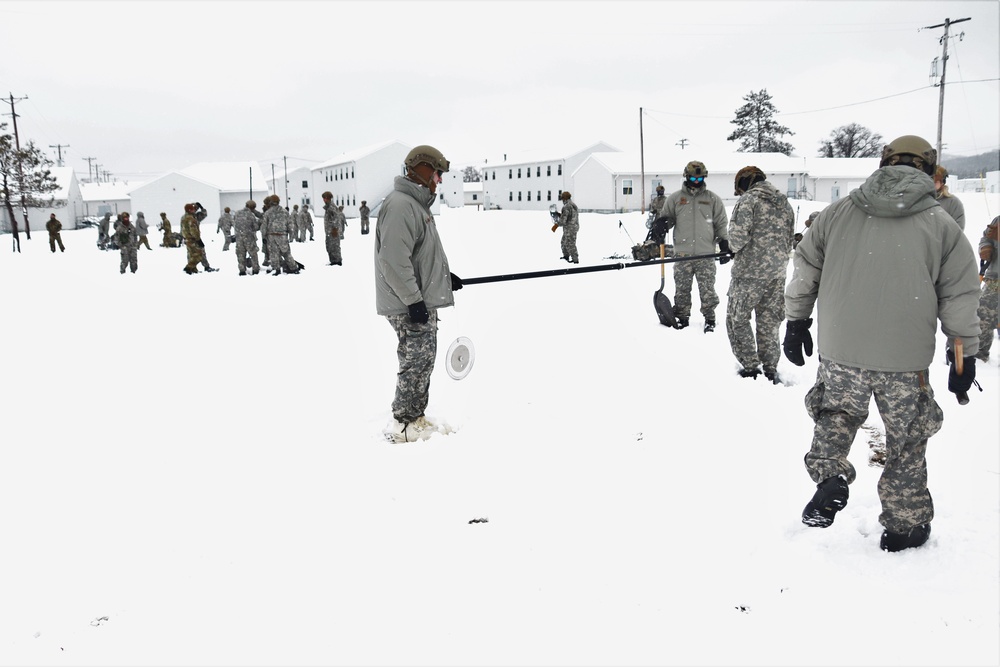 Tent-building among skills Airmen learned during January cold-weather training at Fort McCoy