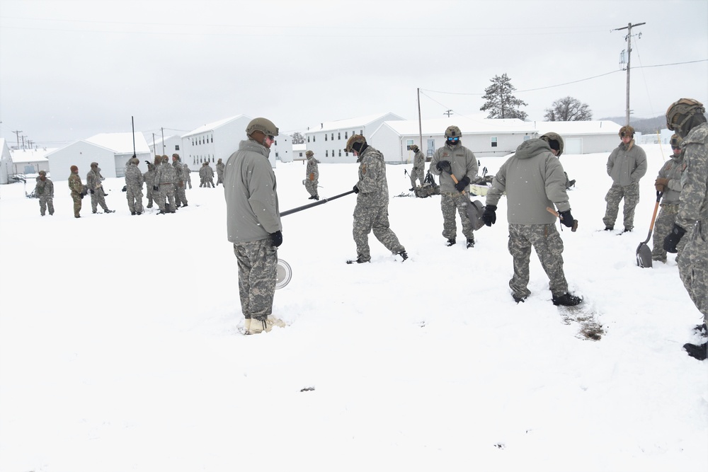Tent-building among skills Airmen learned during January cold-weather training at Fort McCoy