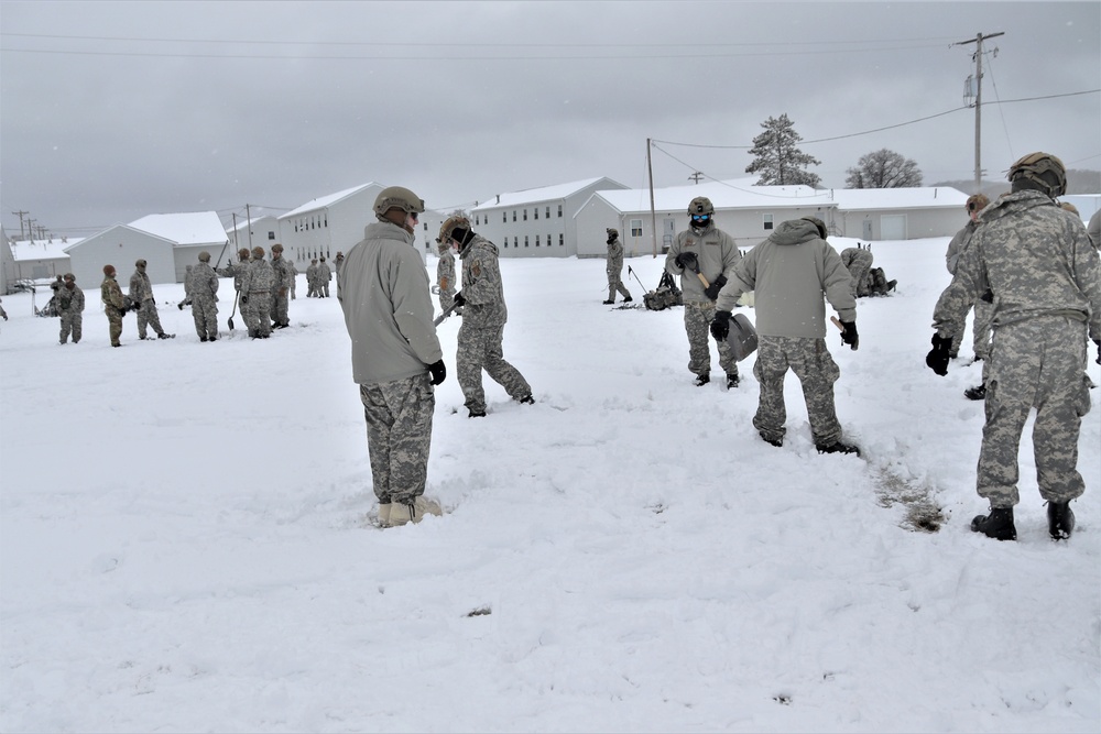 Tent-building among skills Airmen learned during January cold-weather training at Fort McCoy