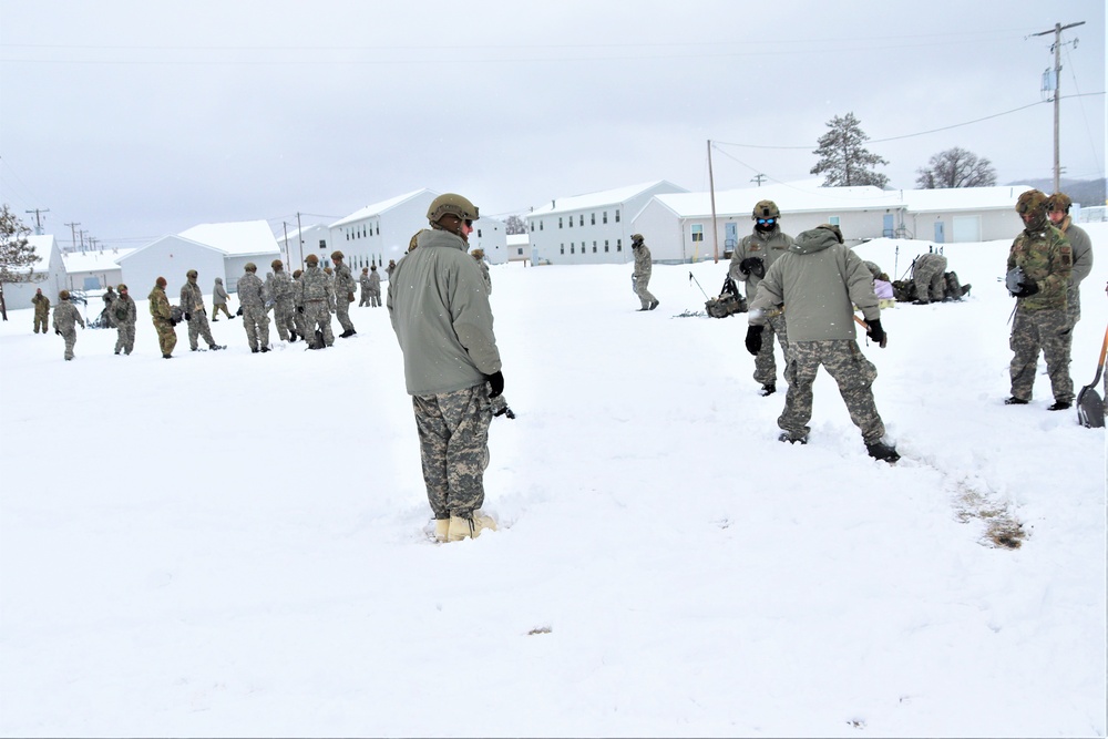 Tent-building among skills Airmen learned during January cold-weather training at Fort McCoy