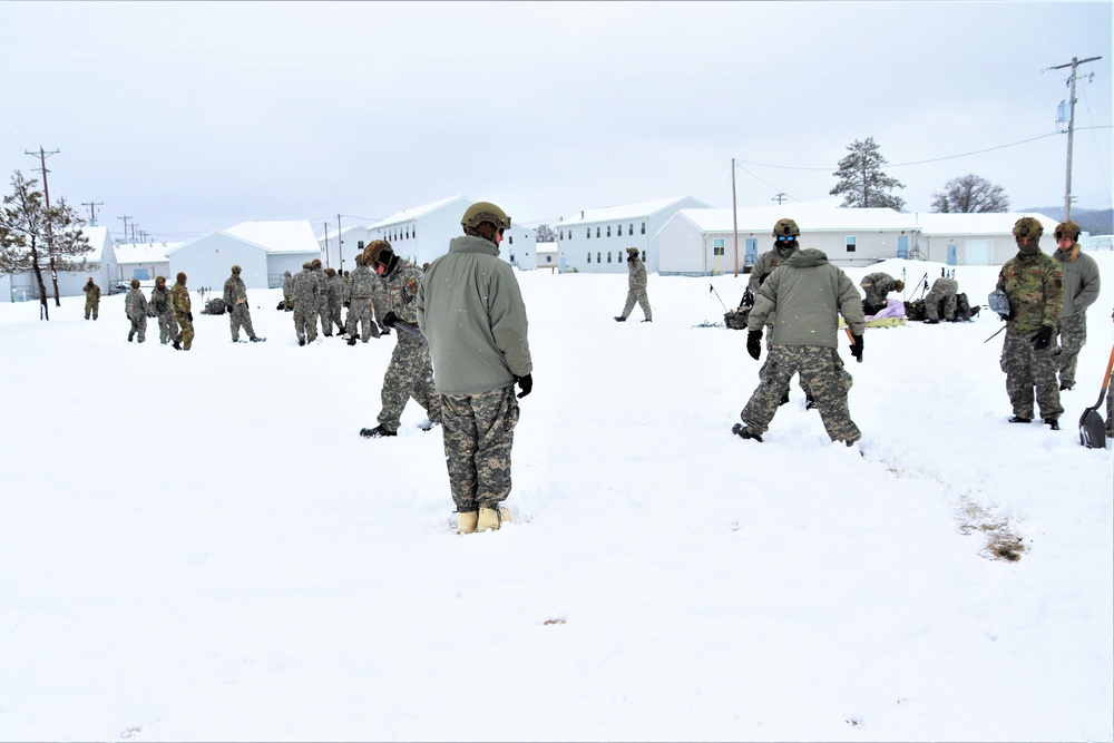 Tent-building among skills Airmen learned during January cold-weather training at Fort McCoy