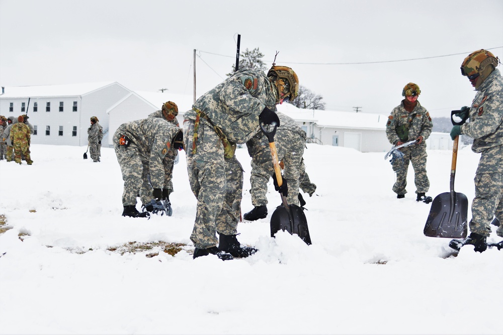 Tent-building among skills Airmen learned during January cold-weather training at Fort McCoy