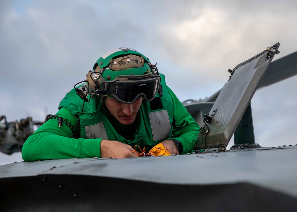 USS Charleston conducts routine flight maintenance