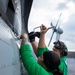 USS Charleston conducts routine flight maintenance