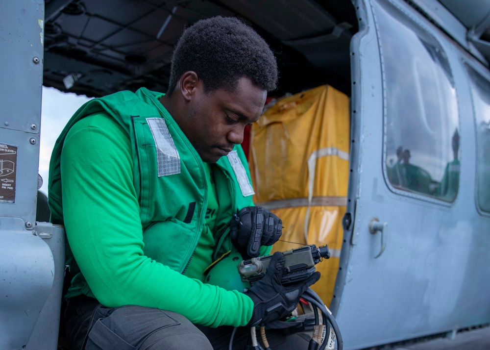 USS Charleston conducts routine flight maintenance