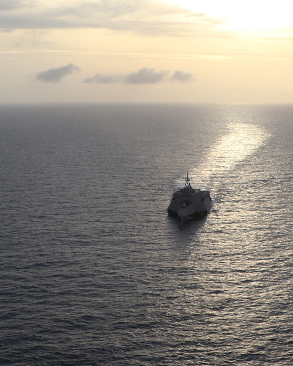 USS Charleston conducts a passing exercise in the South China Sea
