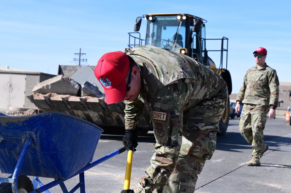 555th Red Horse Squadron demolishes 926th Wing building patio.