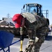 555th Red Horse Squadron demolishes 926th Wing building patio.