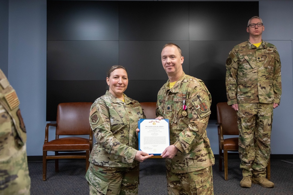 Osiecki awarded meritorious service medal