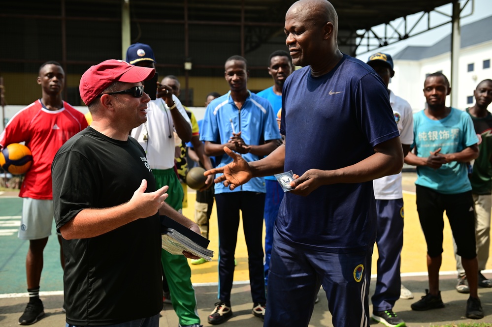 USCGC Spencer (WMEC 905) plays volleyball with members of the Western Naval Command and Naval Dockyard Limited