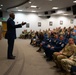 Maj. Gen. Ondra L. Berry speaks to a crowd during Chief Master Sgt. Angela D. Ash's retirement ceremony