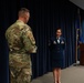 Nevada Air National Guard Command Chief Master Sgt. Kevin Brun congratulates Senior Master Sgt. Jennifer Harrell upon her promotion to the rank of Chief Master Sergeant