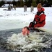 Airmen jump in icy Fort McCoy lake for January cold-water immersion training