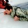 Airmen jump in icy Fort McCoy lake for January cold-water immersion training