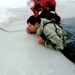 Airmen jump in icy Fort McCoy lake for January cold-water immersion training