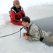 Airmen jump in icy Fort McCoy lake for January cold-water immersion training