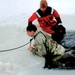 Airmen jump in icy Fort McCoy lake for January cold-water immersion training