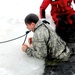 Airmen jump in icy Fort McCoy lake for January cold-water immersion training