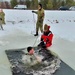 Airmen jump in icy Fort McCoy lake for January cold-water immersion training