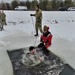 Airmen jump in icy Fort McCoy lake for January cold-water immersion training