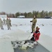 Airmen jump in icy Fort McCoy lake for January cold-water immersion training