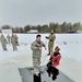 Airmen jump in icy Fort McCoy lake for January cold-water immersion training