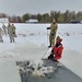 Airmen jump in icy Fort McCoy lake for January cold-water immersion training