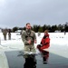 Airmen jump in icy Fort McCoy lake for January cold-water immersion training