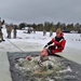 Airmen jump in icy Fort McCoy lake for January cold-water immersion training