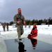 Airmen jump in icy Fort McCoy lake for January cold-water immersion training