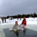 Airmen jump in icy Fort McCoy lake for January cold-water immersion training