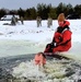 Airmen jump in icy Fort McCoy lake for January cold-water immersion training