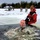 Airmen jump in icy Fort McCoy lake for January cold-water immersion training