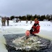 Airmen jump in icy Fort McCoy lake for January cold-water immersion training