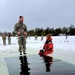 Airmen jump in icy Fort McCoy lake for January cold-water immersion training