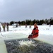 Airmen jump in icy Fort McCoy lake for January cold-water immersion training