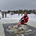 Airmen jump in icy Fort McCoy lake for January cold-water immersion training