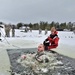 Airmen jump in icy Fort McCoy lake for January cold-water immersion training