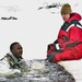 Airmen jump in icy Fort McCoy lake for January cold-water immersion training