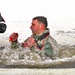 Airmen jump in icy Fort McCoy lake for January cold-water immersion training