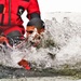 Airmen jump in icy Fort McCoy lake for January cold-water immersion training