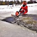 Airmen jump in icy Fort McCoy lake for January cold-water immersion training