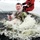 Airmen jump in icy Fort McCoy lake for January cold-water immersion training