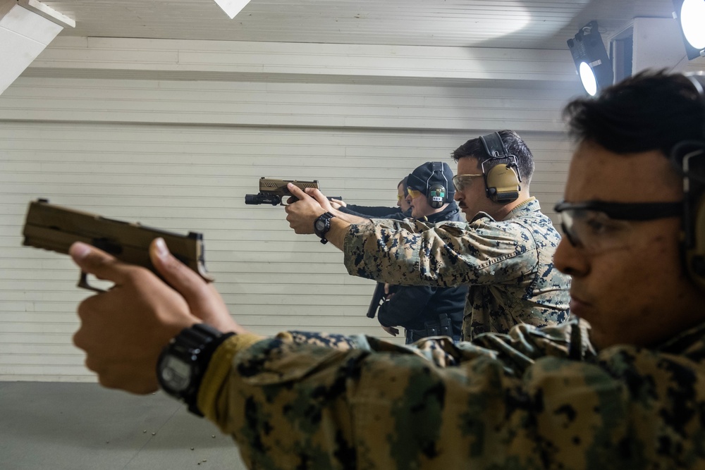 FASTEUR Marines and Latvian Internal Security Bureau Practice Pistol Marksmanship